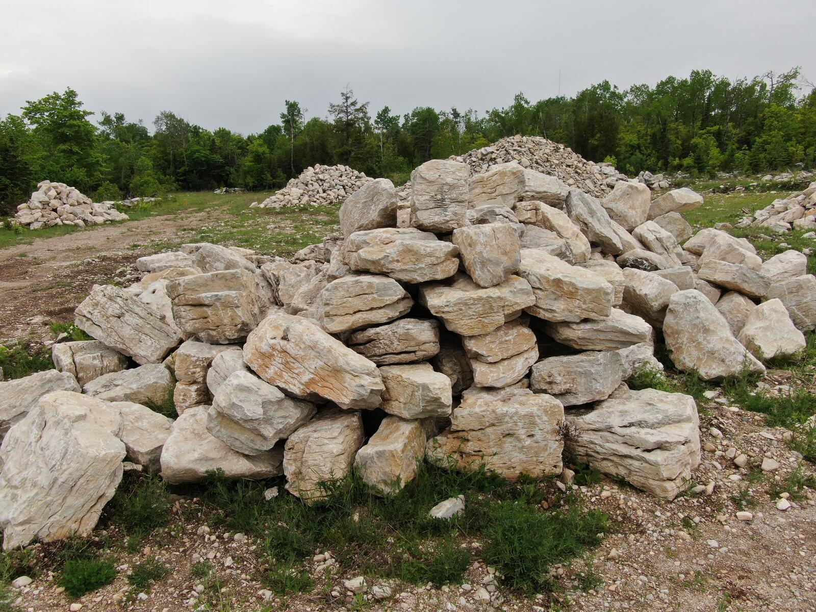 Tall structured stockpile of character limestone
