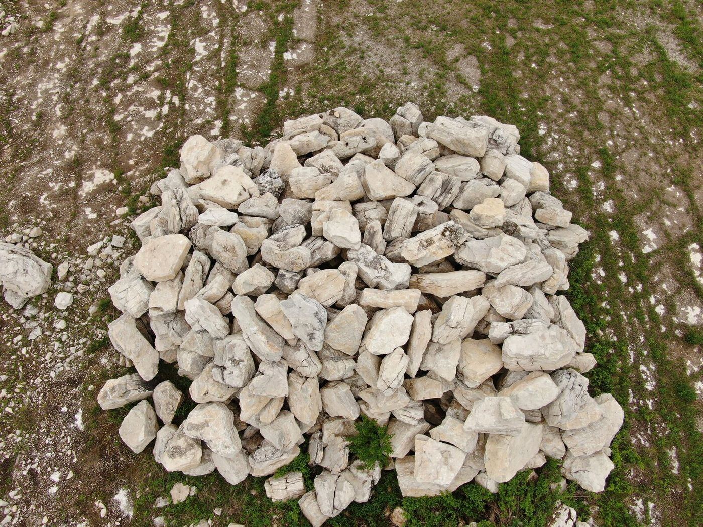 Overhead view of sorted limestone boulder pile
