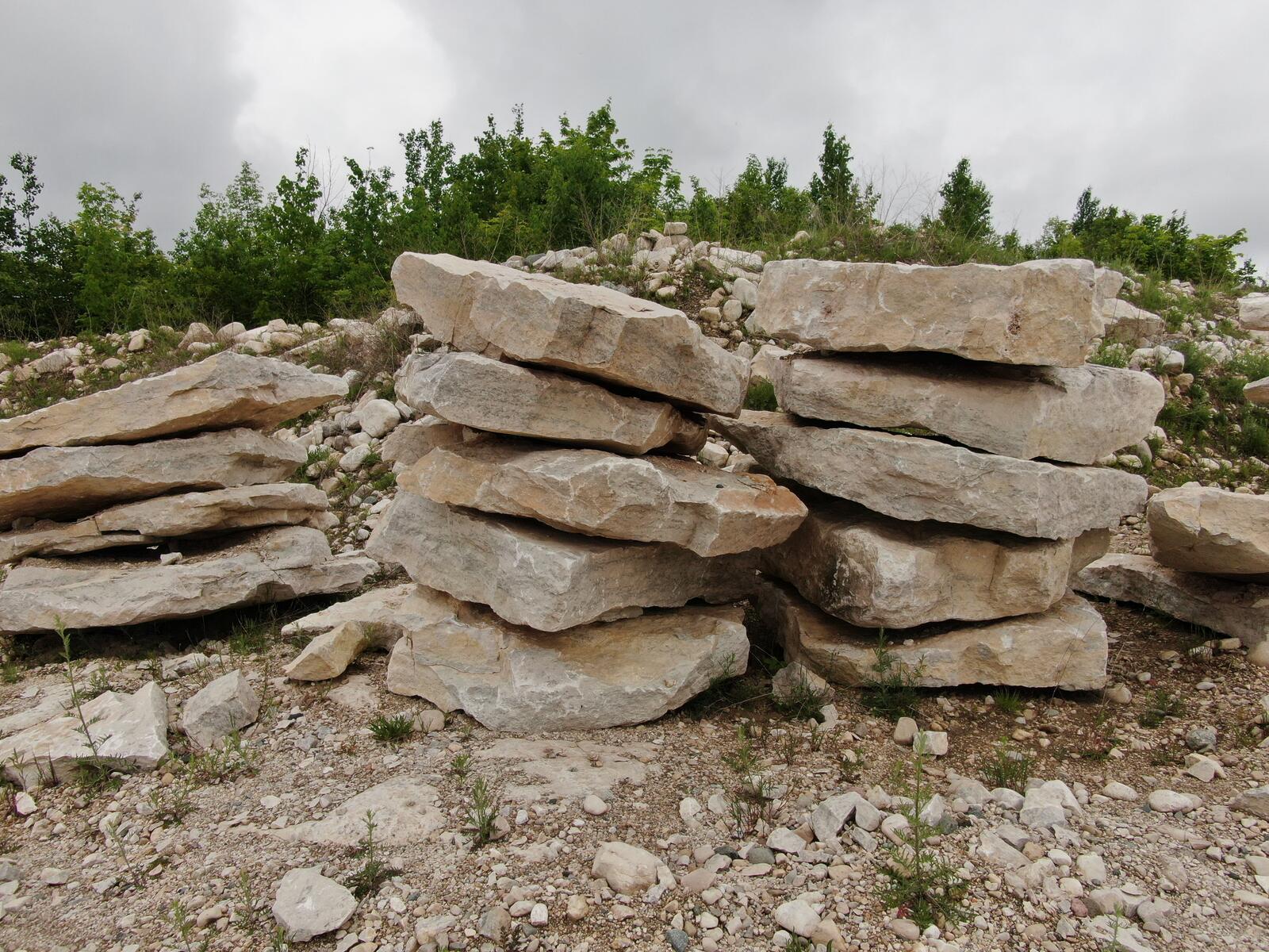 Close stacks of thick limestone slabs and steps