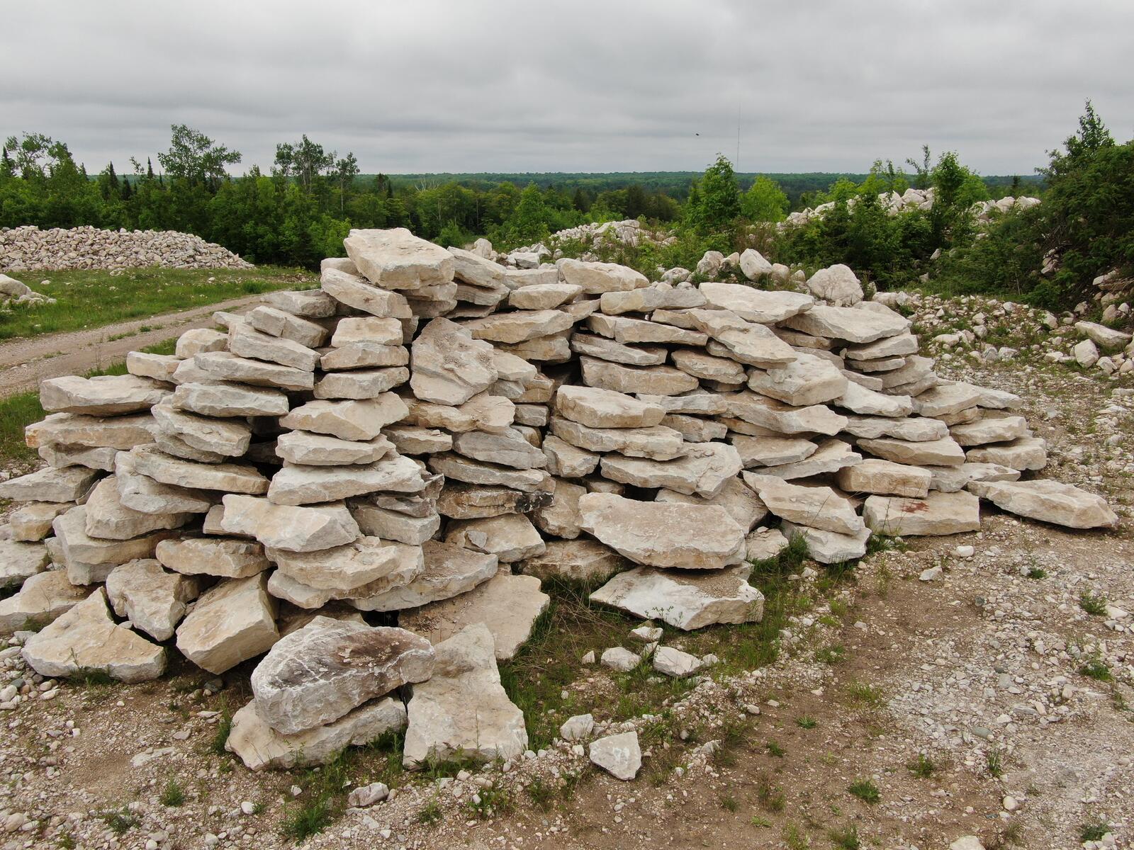 Stacked limestone slabs and wallstone