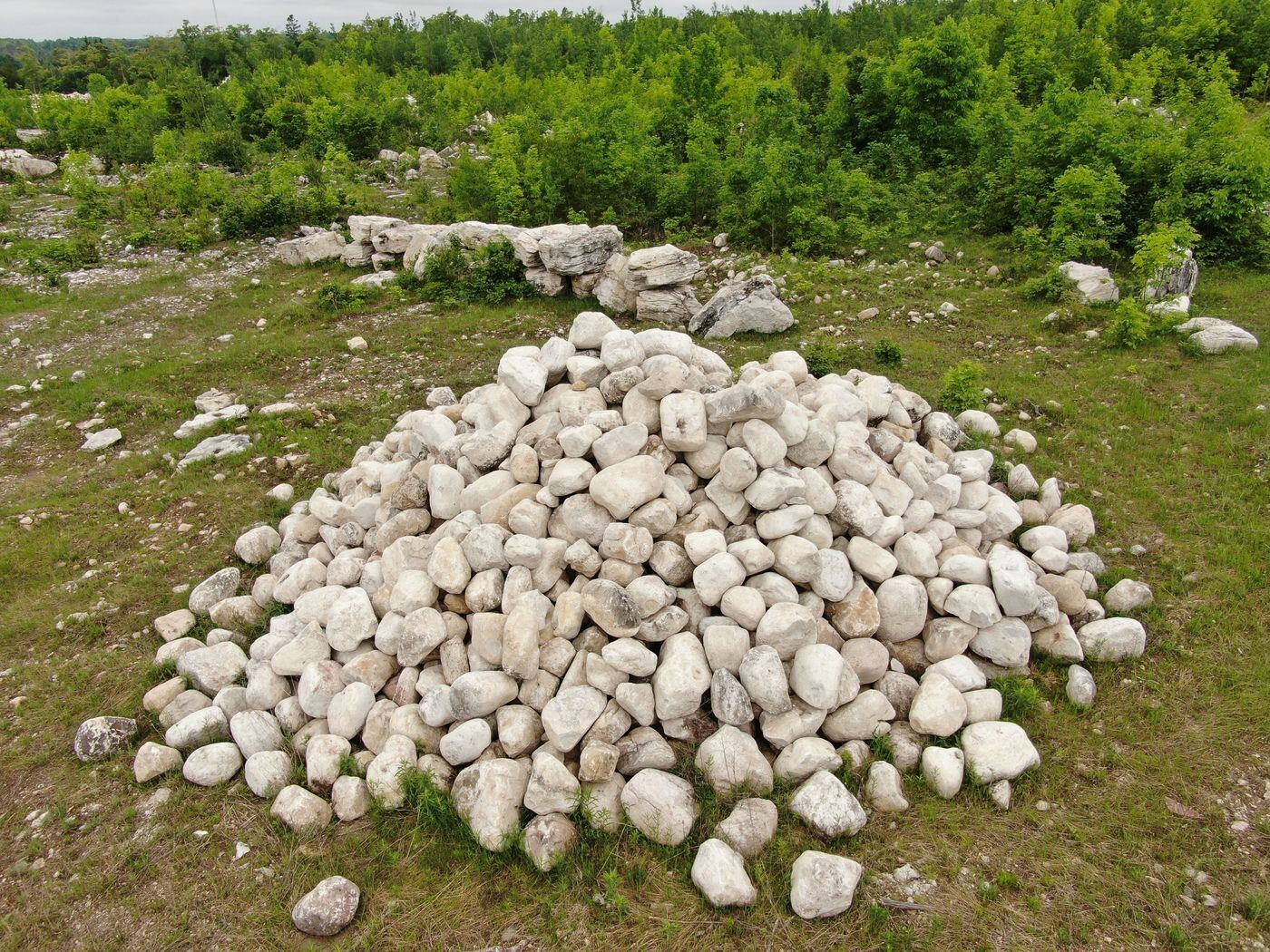 Pile of rounded white limestone boulders